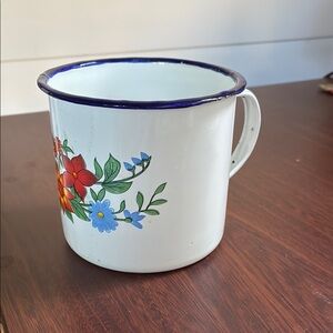 Vintage floral enamel mug.